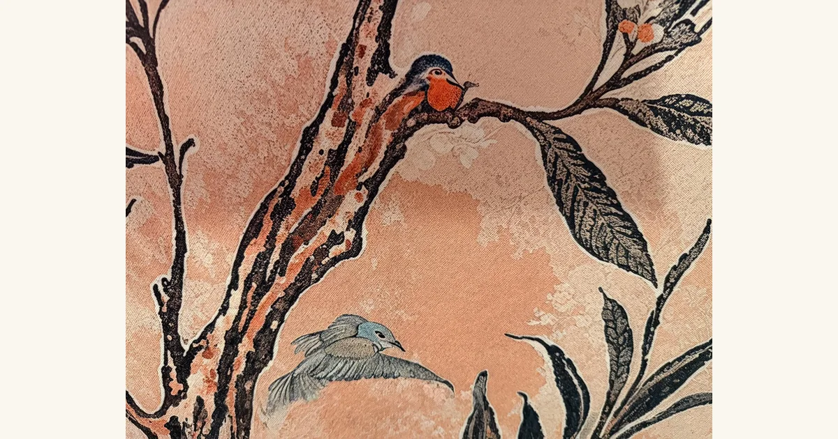 Close-up of the mural showing a bird’s body blending into a tree branch.