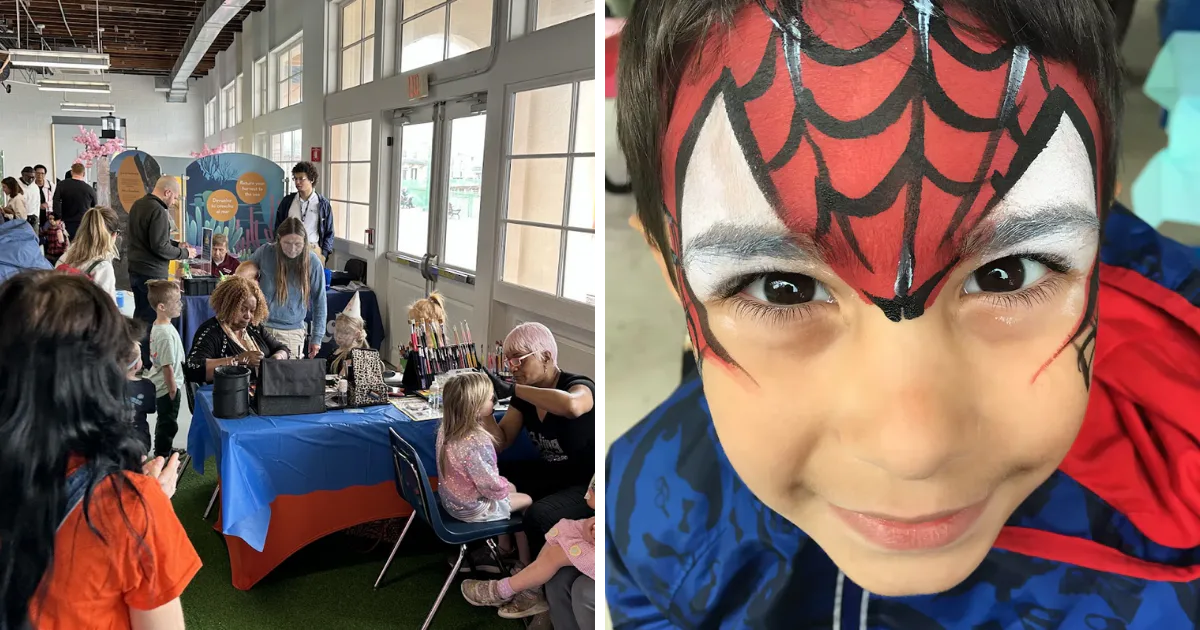 Face-painting station and child wearing Spider-Man face paint at the Westchester Children’s Museum celebration.