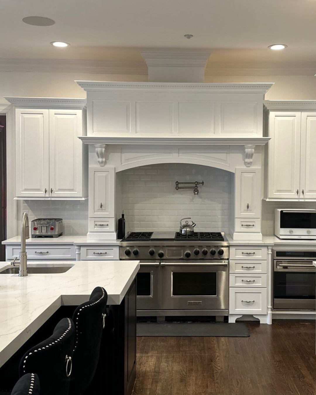 Harrison kitchen after cabinet refinishing.