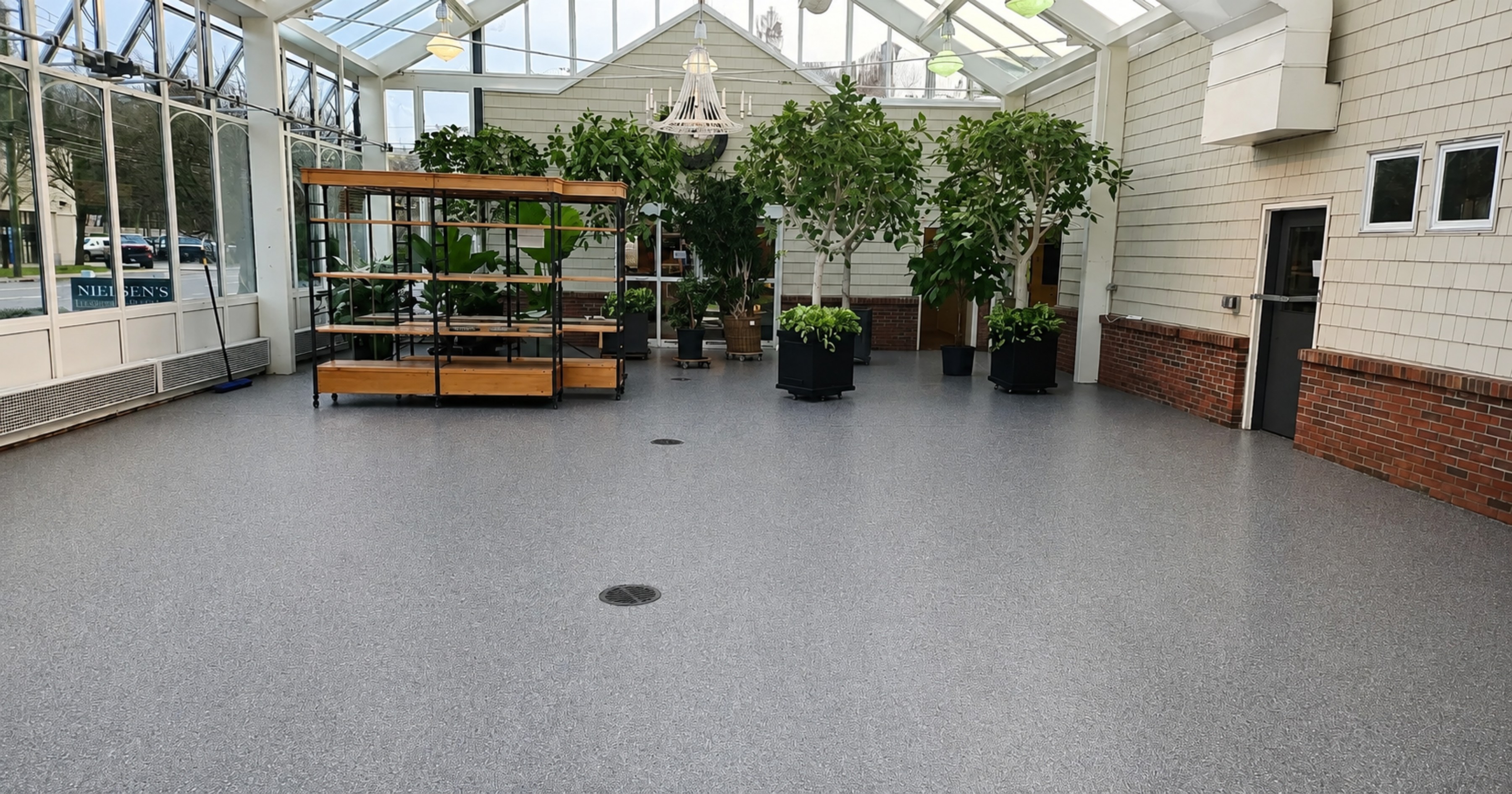 Decorative flake floor coating in a greenhouse.