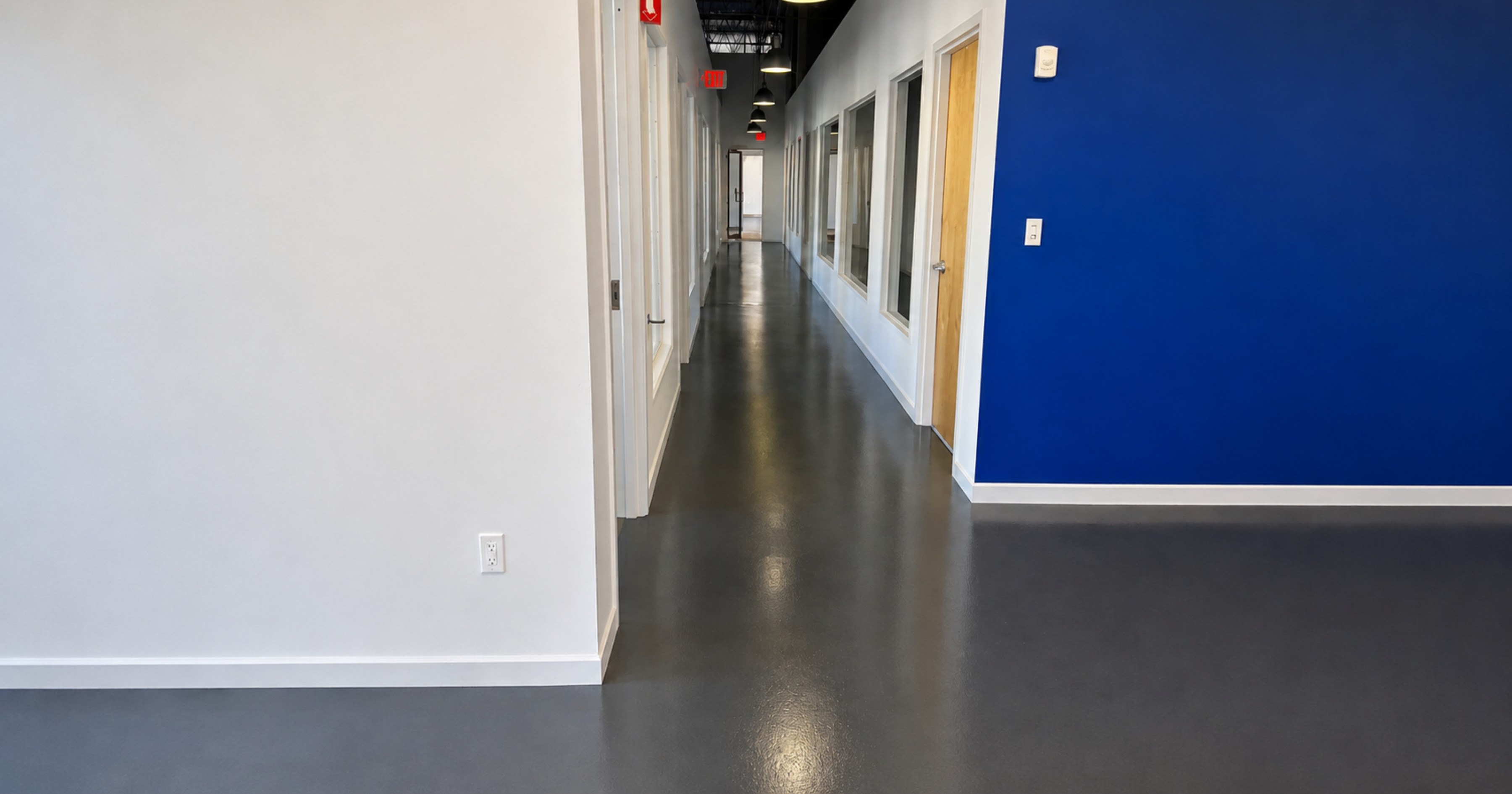 Urethane topcoat floor coating in a corridor.