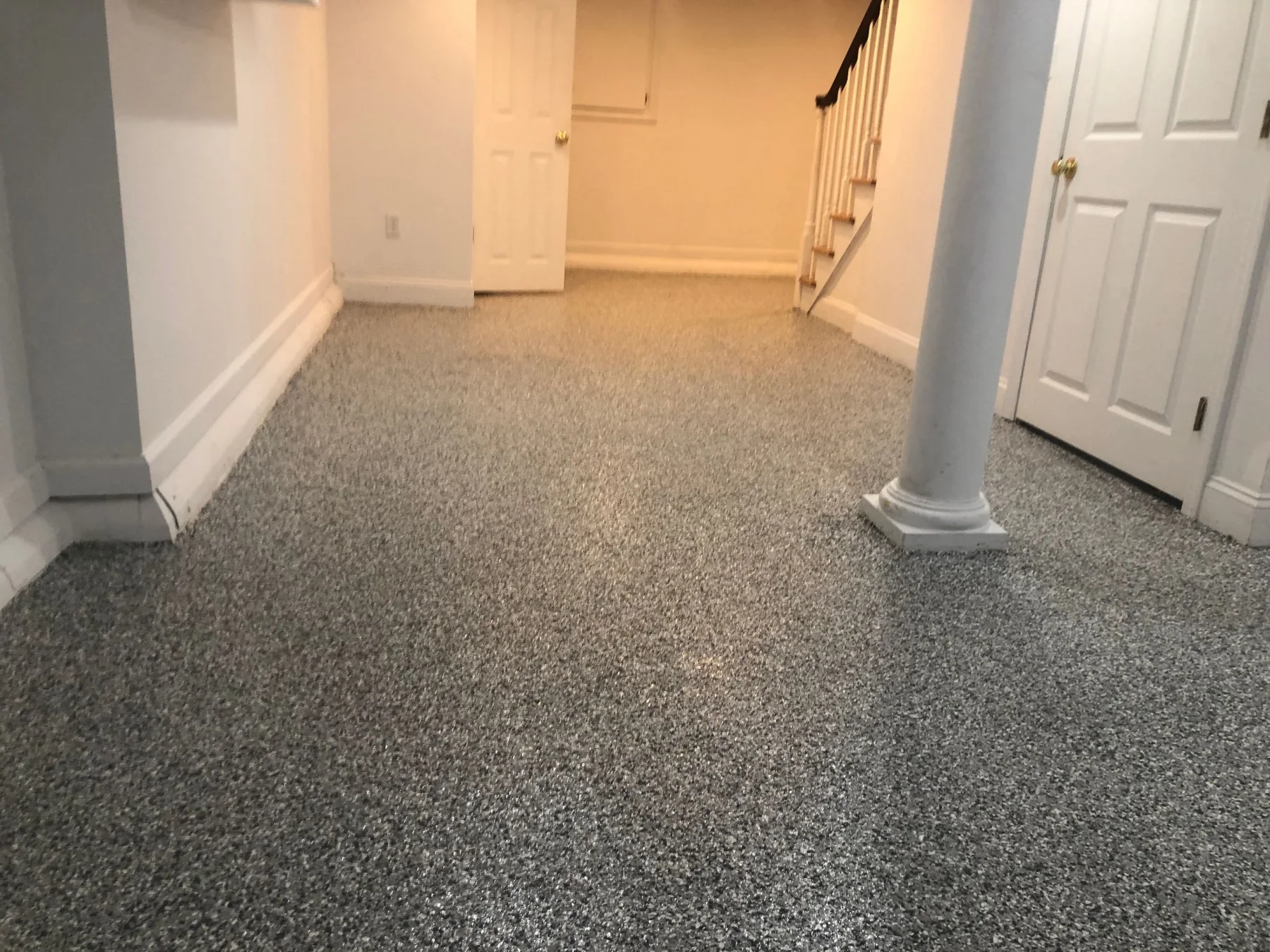 Residential basement floor after coating in the Wombat color blend.