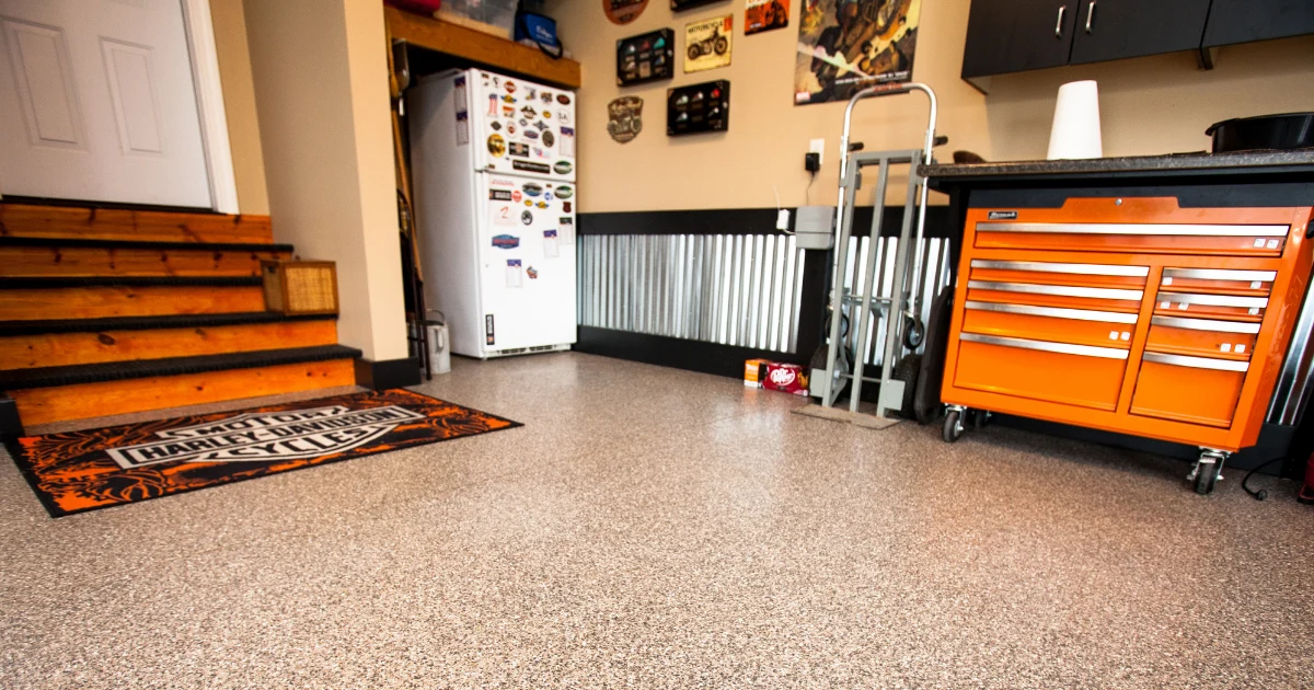Harley-Davidson motorcycle parked on a finished residential garage floor coating.