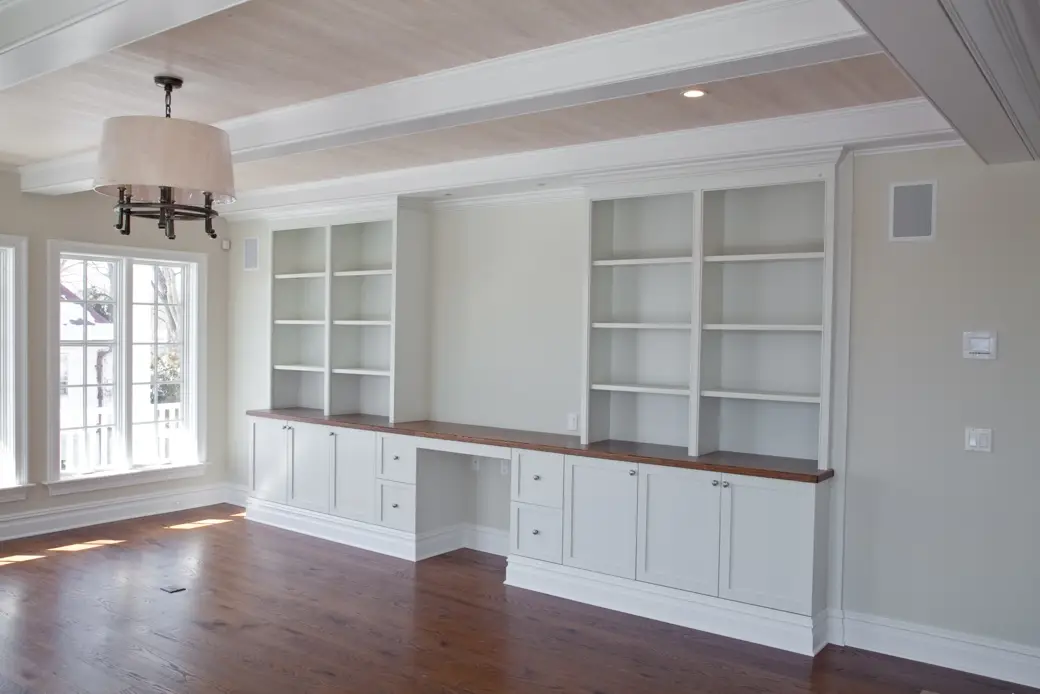 Interior room with finished built-ins and detailed paintwork.